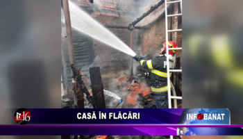 Casă în flăcări