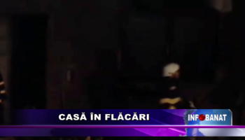 Casă în flăcări