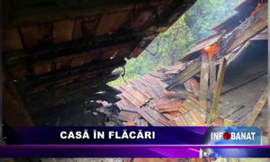 Casă în flăcări